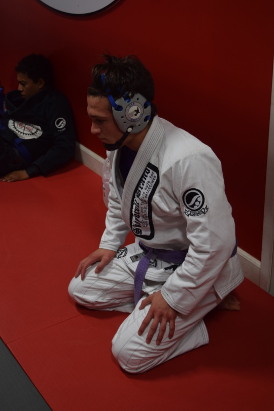 Raphael’s training partner, Jean Paul Lebosnoyani, prepares for another round of “rolling,” a form of Jiu Jitsu training.