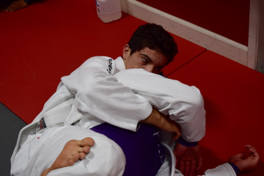 Raphael focuses on his opponent’s movements to perform the proper Jiu Jitsu moves.
