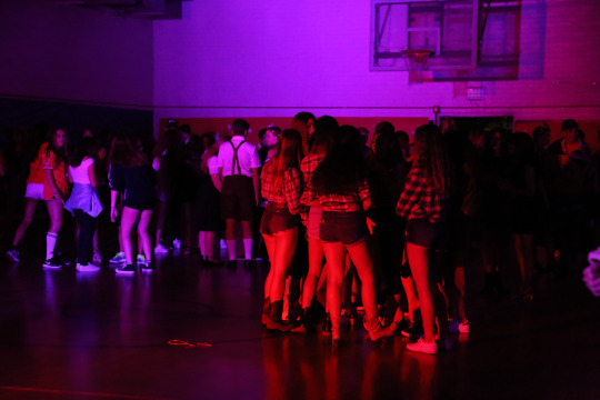 Students dance together in the small gym during the Homecoming dance at 7pm on Saturday. 