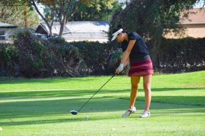 Varsity senior Ashley Kim tees off at the 3rd hole driving the ball all the way to the green during Bay League Finals.