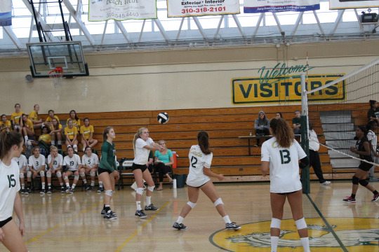 Sophomore Riley Hazelrigg bumps the ball to hold the lead in the first match.