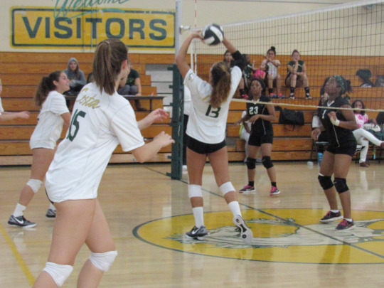 The Mira Costa Girls set up an offensive play against the Inglewood Girls, successfully progressing them in the match.