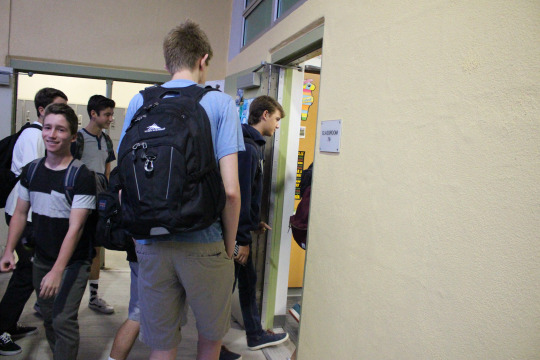 Sophomores and Juniors walk into their testing classrooms for the PSAT on Wednesday morning in room 79. All sophomores and juniors were eligible to take the PSAT in the morning before school.