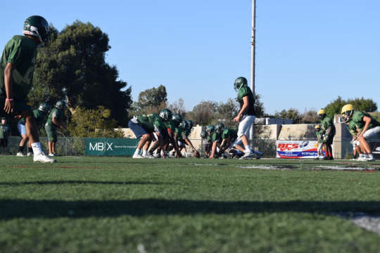 The Mira Costa Varsity football team faces off in an offense versus defense matchup during Wednesday’s practice.