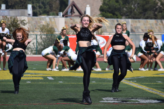 Girls on the JV Costa dance team perform in front of the cheerleaders at the Pep Rally.