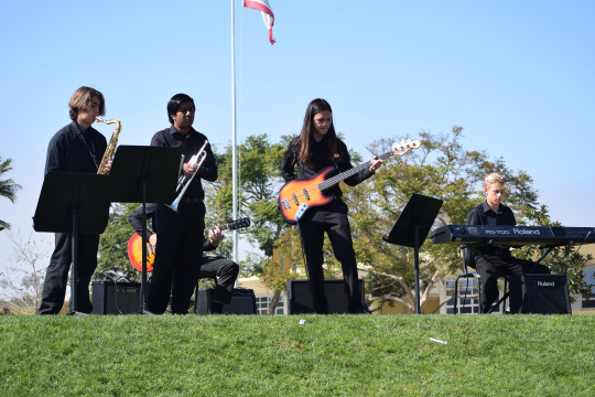 Costa student band performs in front of TedX attendees during their lunch break in the quad.