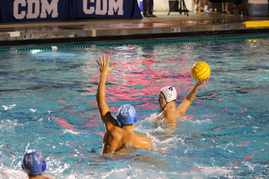 Starting player Christian Thornton takes a shot on goal during the boys’ away game against Corona Del Mar.