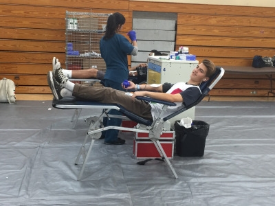 Junior Ben Sheres donates enough blood to potentially save three lives during PM Office Hours on Wednesday, November 16th.