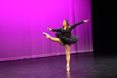 Desiree Ayala dances a solo to the song Esmeralda which she also choreographed in the small theater at the dance show. 