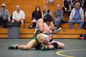 Varsity Junior William Curtis chicken wings the Warriors captain, eventually loosing the match 3 to 7.