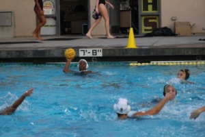Senior Skylar Jefferson passes the ball to her teammate on Tuesday at the Girl’s Water polo game.