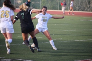 Senior Whitney Davis stopped South’s advance downfield.