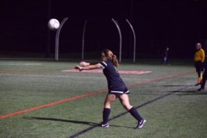 Senior Emmie Farber throws the ball in during Tuesday’s girls varsity soccer game versus Redondo Union High School.