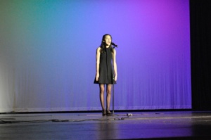 Junior Olivia Morgan sings “How Far Will I Go”, wrapping up the talent show. 