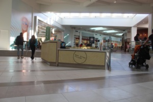 There is a brand new concierge stand in the center of the mall.
