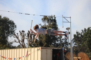 Nicosia holds onto his pole on the way up to the crossbar.