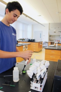 Sophomore Ethan Ward calibrates his pH meter during Mrs. Neilson’s second period chemistry class, in order to accurately measure the pH levels of various solutions for a lab project. The lab was started last Thursday to allow enough time for any possible changes in some of the solutions.
