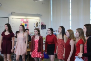The girls a cappella group, Catorie, sings to Costa Senior Robert Bixler during his 4th period Spanish class. The group performed their take on “Electric Love” by BØRNS.