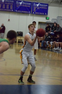 Ryan White shoots a free throw after being fouled by a St. Joseph player. St. Joseph was able to edge out Mira Costa 67-65 in the final seconds of the game.