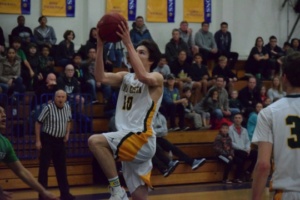 Junior Bobby Barkley puts up a lay-up during the first half of the game. The game was moved to El Segundo High School after a leak was discovered in the Mira Costa gym.