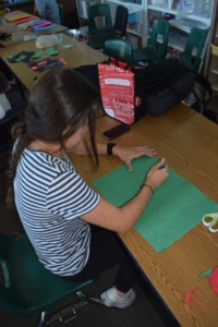 Senior Whitney Davis creates decorations for the upcoming ASB mixer during fifth period on Thursday in the ASB room. Last year, students came from all over Los Angeles County to meet other Associated Student Body members from other schools in the greater Los Angeles area at Mira Costa’s ASB mixer.