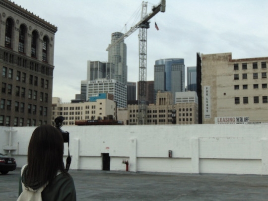 On top of a parking lot in Downtown LA, Good society MCHS senior Mia Finney takes a shot of the the US Bank. Mia is not only the co-founder of Good Society, but came up with the name of the photo group as well.