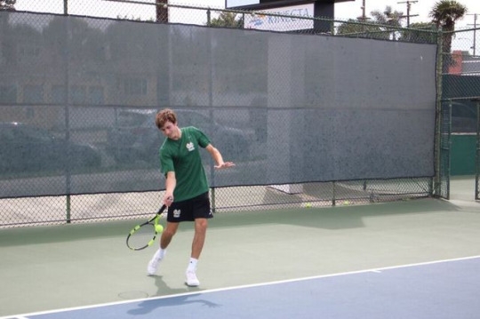 Mira Costa Junior Jon Scalibrini returns a ball to his Arcadia opponent during the Mira Costa Boys Varsity tennis game on Wednesday, March 22nd. Scalibrini made many swift returns to the Arcadia Boys that aided the Mira Costa Boys defensively.
