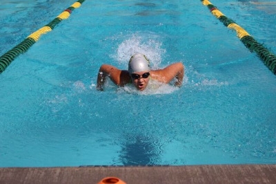Freshman Karli Wallace swims the 50 meter butterfly for Frosh Soph for the SBI finals. Wallace did very well at Prelims and got 3rd in her heat for finals.