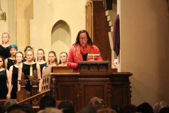 The Reverend Dr. Rachel Anne Nyback of Saint Cross by the Sea Episcopal Church introduces the Mira Costa High School Choir. The Choir performed on Tuesday night at 7 pm at St. Cross by the Sea.