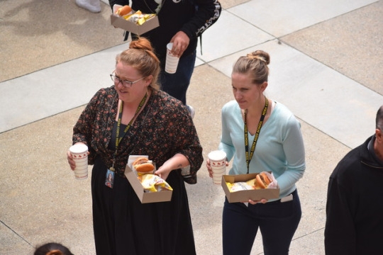 Costa English teachers Ms. Hutchinson and Ms. Gabbert walk to their classrooms after receiving a free In ’n Out lunch from the honor roll lunch today in front of the admin building.  Costa offered a free lunch to anyone who was on honor roll last semester.