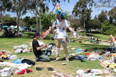 One local brought lots of trash that ruins our ecosystem to tape onto themselves to show how many things ruin our Earth. They were making an art piece out of all the trash to repurpose it and not let it go to waste.