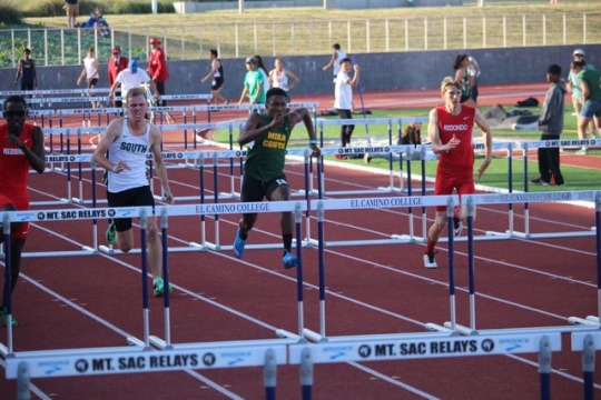 Isaac Bedford competes hurdles against opponents from Redondo Union High School and South High School. The track meet was held at El Camino and it was the South Bay Championship meet.