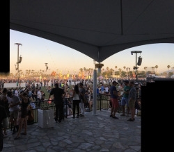 People relax and get a bite to eat at the VIP area of Coachella. They talked to each other and waited till their next favorite band would come on.