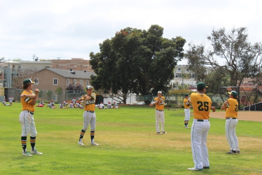 Costa’s Varsity baseball team warms up on Thursday at home against Redondo for the Bay League Champ title. The Mustangs pulled through and beat Redondo 6-2.