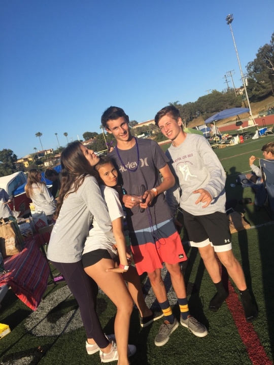 9th graders are taking a break from walking and are having a good time with each other’s company. They posed for a picture and were getting ready to walk again.