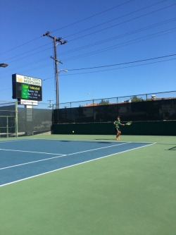 Trent porter hitting a forehand in his match against peninsula on court 4 at the Costa courts May 2 2017. The forehand was hit cross court to the other team and ended up losing the point. 